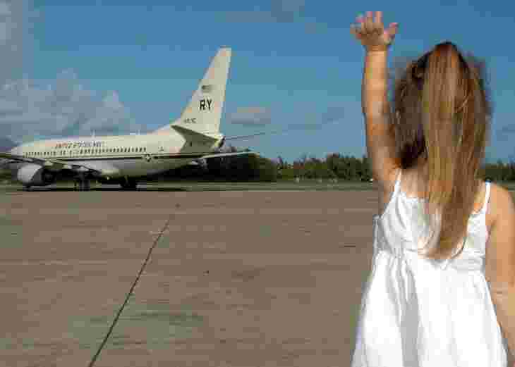 Child Waving Goodbye